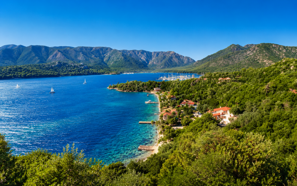 Paradise Bay among the hidden bays of Marmaris with turquoise waters and lush green hills.
