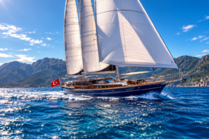 Classic gulet under sail on a luxury gulet charter in Turkey